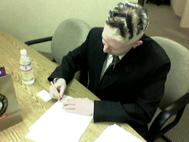 Our fearless leader signs the CC26 Contract